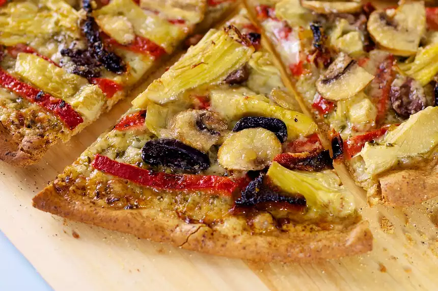 Basil Pesto, Artichoke Hearts, Sun-dried Tomato and Roasted Bell Pepper Pizza